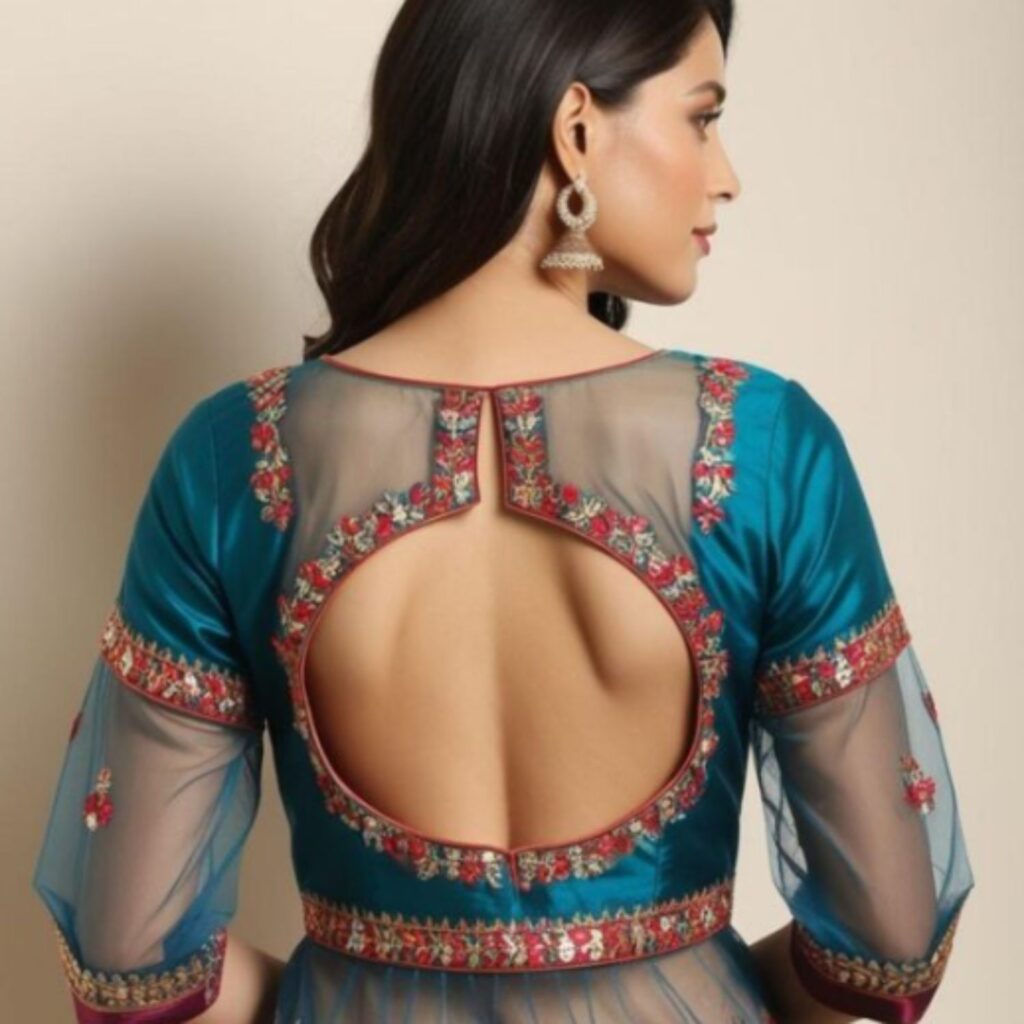 Trendy Indian plus-size blouse with a keyhole back and delicate net insert for a sensual and intriguing look.